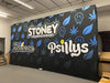 Black foam mattress with blue cannabis leaf patterns and Stoney branding on 20ft pop up display
