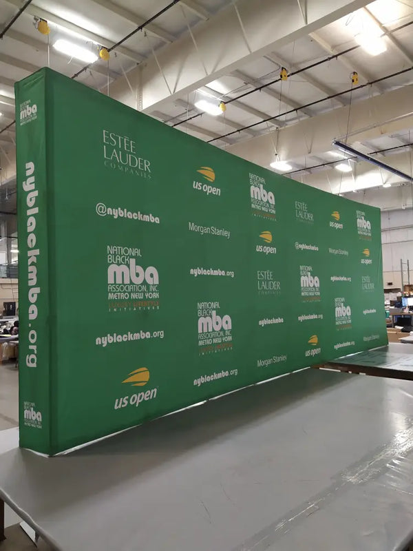 Our 20ft Straight Pop Up Fabric Display Table Kit includes a 6ft or 8ft fitted style cover to match your and black