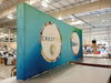 Our 20ft Straight Pop Up Fabric Display Table Kit includes a 6ft or 8ft fitted style cover to match your and black