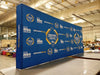 Our 20ft Straight Pop Up Fabric Display Table Kit includes a 6ft or 8ft fitted style cover to match your and black