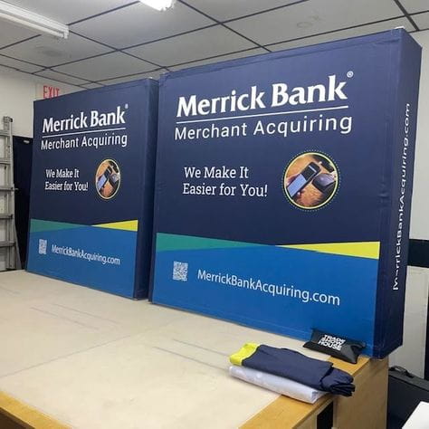 Blue and Teal Merrick Bank Merchant Acquiring Display Stands