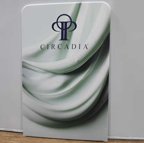 Sleek Circadia 5ft tension fabric banner stand with green wave pattern