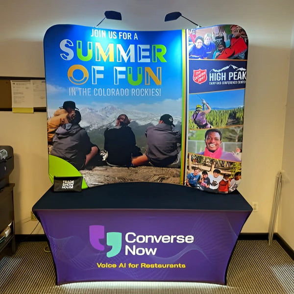 6ft Curved Tabletop Tension Fabric Display with purple cover, Converse Now logo, and Voice AI for Restaurants text