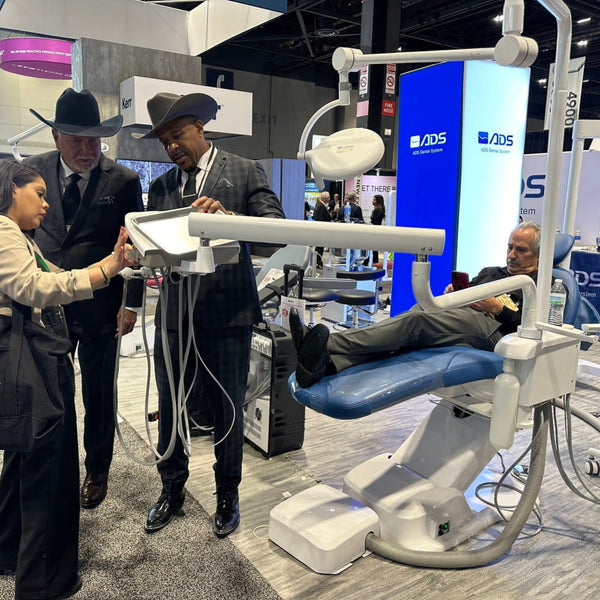 White and blue dental chair in 8ft backlit SEG light box tower