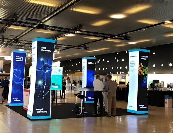 Blue backlit inflatable tower with neural network drug discovery graphics