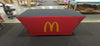 Red and black backlit stretch table cover with McDonalds golden arches logo