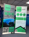 Two deluxe 33-inch retractable banner stands for brrr.com with globe and loan info