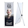 Haute brand sale banner: model in bold makeup, dark clothes on silver background, 50% off