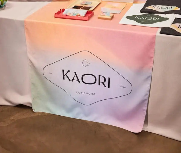 Personalized middle fabric table runners can put the finishing touch on a covered with solid color cover (under throw).
