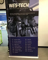 Wes-tech automation banner stand with black purple robotic arms