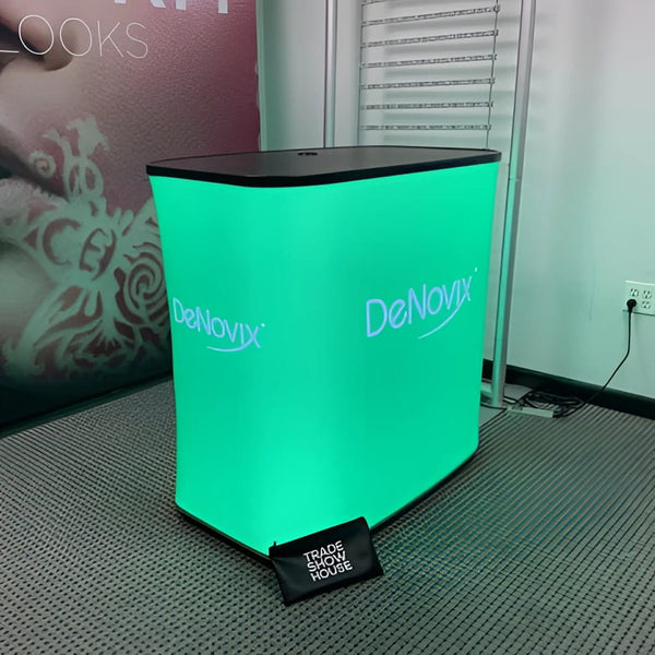 Glowing green Denovix backlit inflatable rectangle counter display