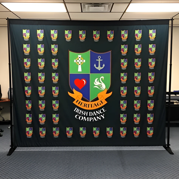 Heritage Irish Dance Company logo repeating on black Step & Repeat banner stand