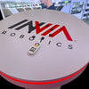 XRCT Round Charging Table with red LED ring and Inwa Robotics logo
